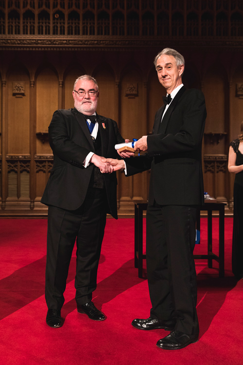Professor Alistair Greig (right) receiving his award from IMarEST President Professor CG Hodge
